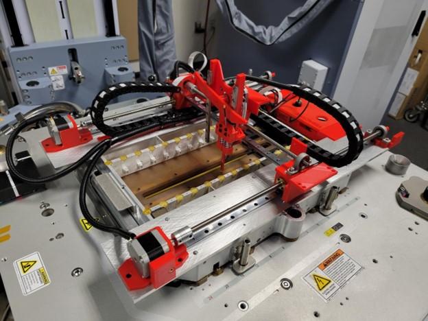 Completed Teradyne Cartesian robotic test system installed over the connector fixture